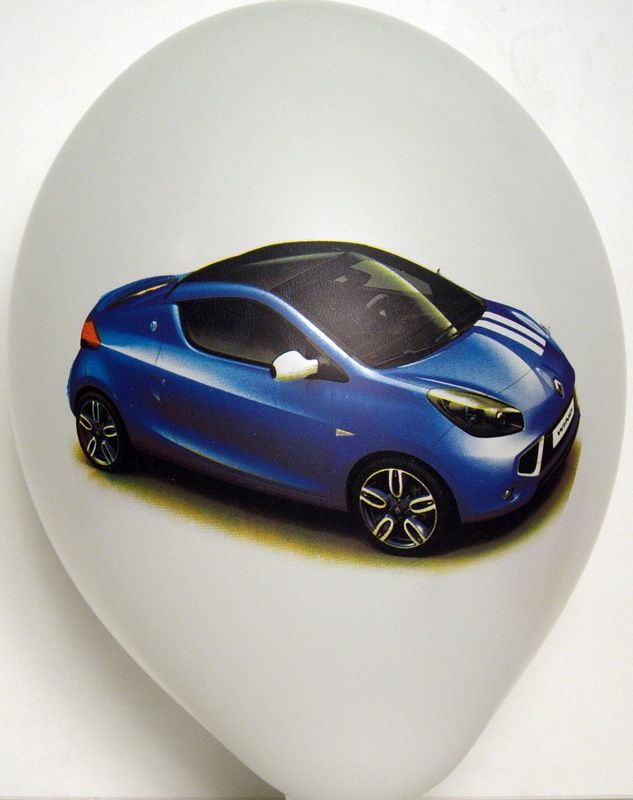 CMYK print on a balloon: blue car