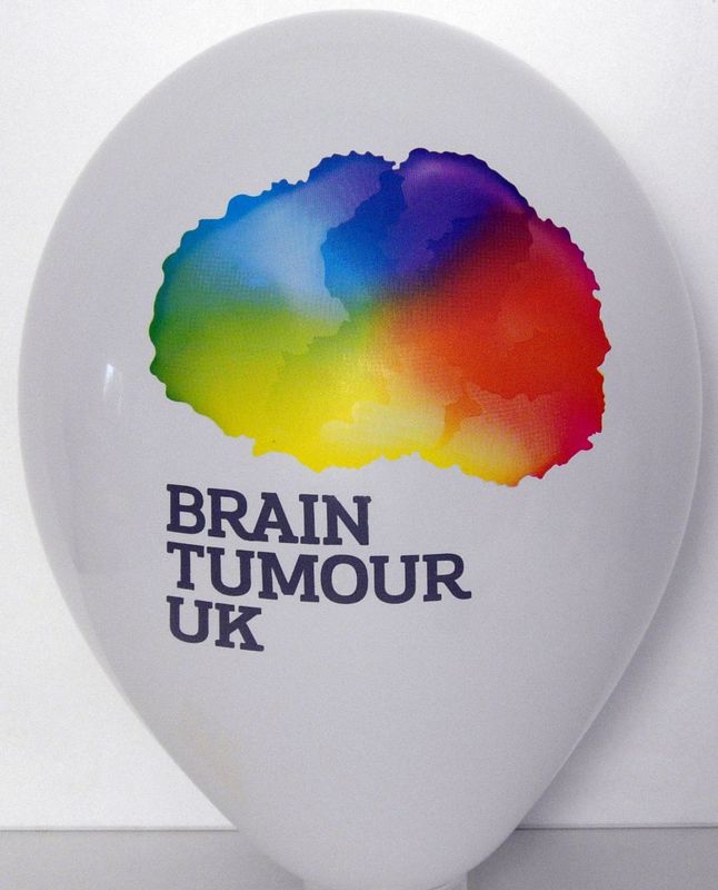 Brain Tumour UK logo with a rainbow brain printed on a white balloon