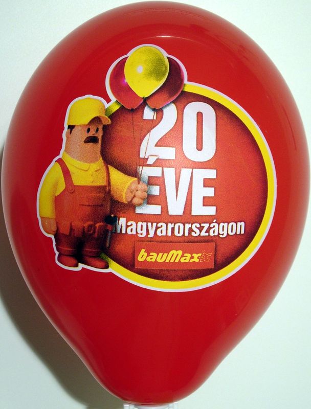 CMYK print on a balloon: '20 éve' red