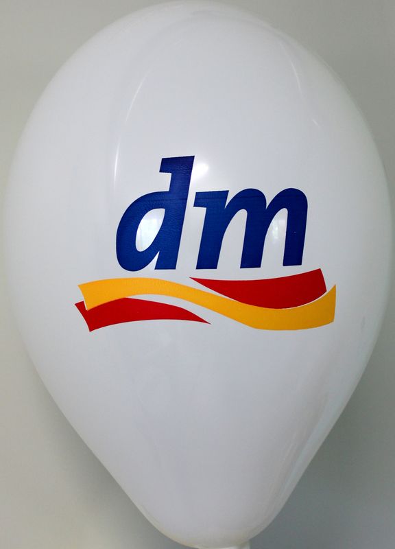 dm logo printed on a white balloon